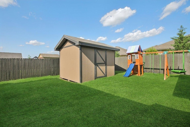 5106 La Piedra Ln, Killeen, TX 76549 - view of shed featuring a fenced backyard and a playground