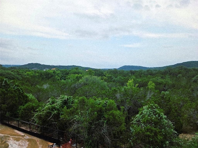 5316 Bellano Bnd, Leander, TX 78641 - view of mountain backdrop with a forest
