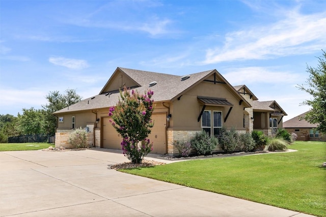 105 Quiet Oak Cv, Liberty Hill, TX 78642 - view of front of property with stone siding, stucco siding, driveway, a front lawn, and an attached garage