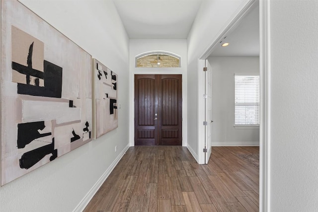 105 Quiet Oak Cv, Liberty Hill, TX 78642 - entryway with wood finished floors and baseboards