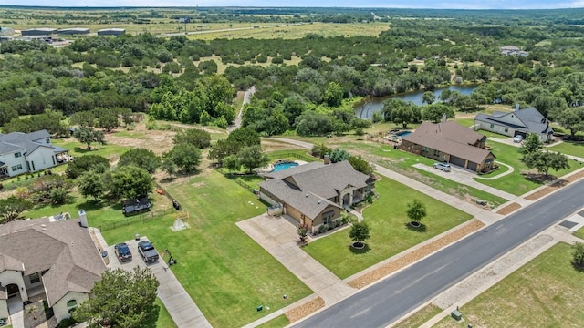 105 Quiet Oak Cv, Liberty Hill, TX 78642 - aerial view of property and surrounding area with a large body of water and a forest