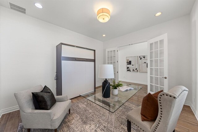 105 Quiet Oak Cv, Liberty Hill, TX 78642 - living area with wood finished floors and recessed lighting