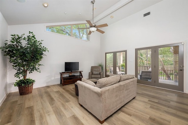 1501 Johnny Miller Trl, Austin, TX 78746 - living area featuring a ceiling fan, light wood-style floors, high vaulted ceiling, and french doors