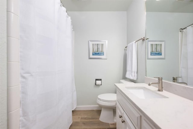 1501 Johnny Miller Trl, Austin, TX 78746 - full bathroom featuring wood finished floors, vanity, and curtained shower