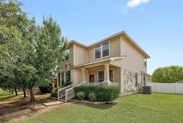 17832 Kenai Fjords Dr, Pflugerville, TX 78660 - traditional home with stone siding and covered porch