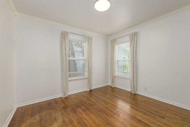 1901 Madison Ave, Austin, TX 78757 - spare room featuring healthy amount of natural light, wood finished floors, and ornamental molding