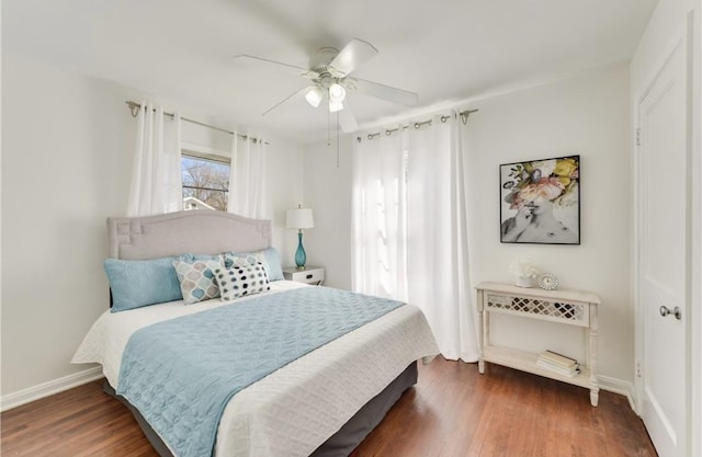 504 Denson Dr, Austin, TX 78752 - bedroom with wood finished floors and a ceiling fan
