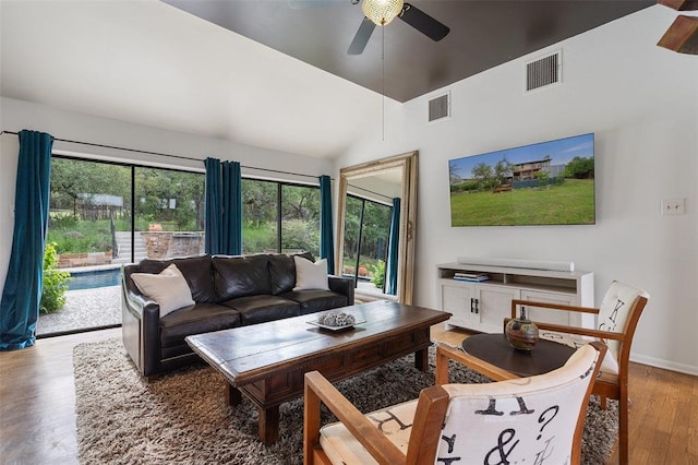 5308 Great Divide Dr, Bee Cave, TX 78738 - living area with plenty of natural light, wood finished floors, ceiling fan, and high vaulted ceiling
