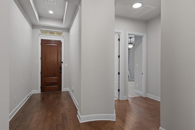 416 Hereford Loop, Hutto, TX 78634 - entryway featuring dark wood finished floors and baseboards
