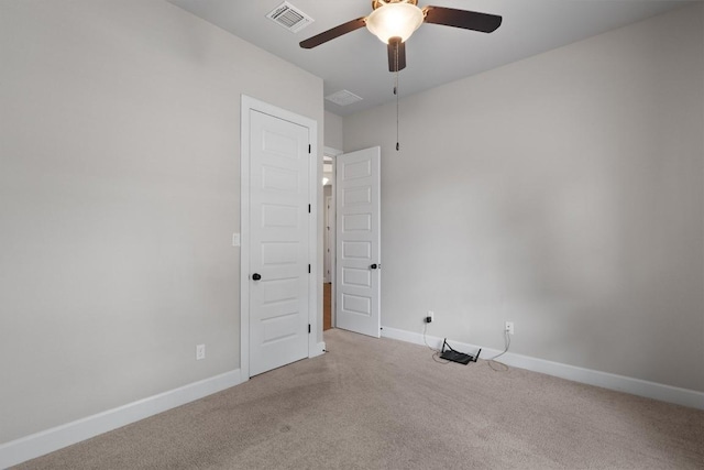 416 Hereford Loop, Hutto, TX 78634 - carpeted spare room featuring ceiling fan and baseboards