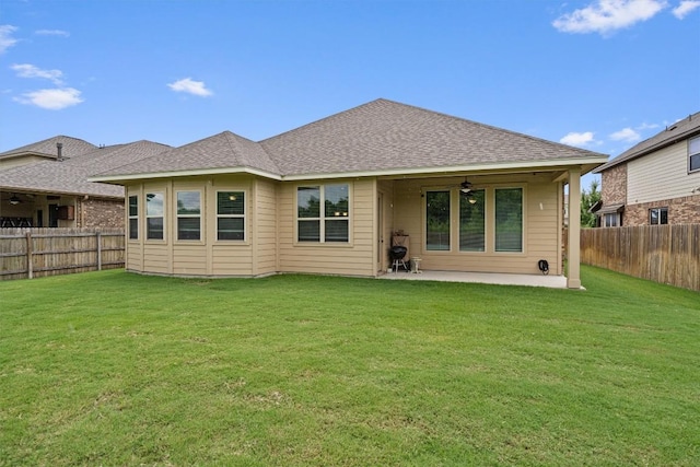 416 Hereford Loop, Hutto, TX 78634 - back of property with a ceiling fan, a patio, a fenced backyard, and a shingled roof
