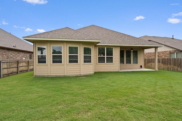 416 Hereford Loop, Hutto, TX 78634 - back of house with a patio area, a fenced backyard, and roof with shingles