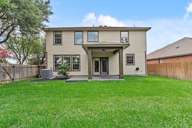 2003 Woodway Dr, Leander, TX 78641 - rear view of property featuring a patio and a fenced backyard