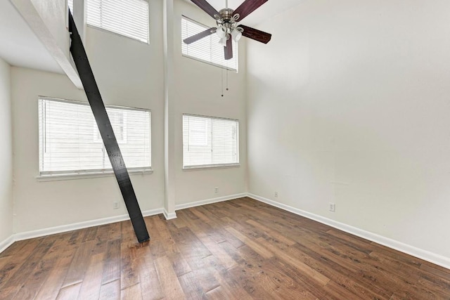 1010 W 23rd St Unit 2, Austin, TX 78705 - spare room with ceiling fan, plenty of natural light, wood finished floors, and a high ceiling