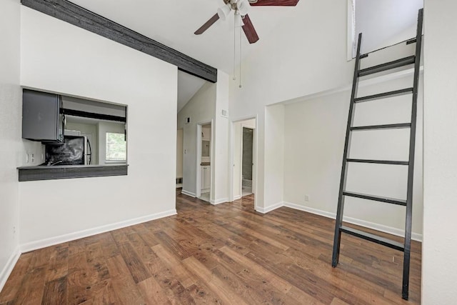 1010 W 23rd St Unit 2, Austin, TX 78705 - unfurnished living room with a ceiling fan, wood finished floors, and high vaulted ceiling
