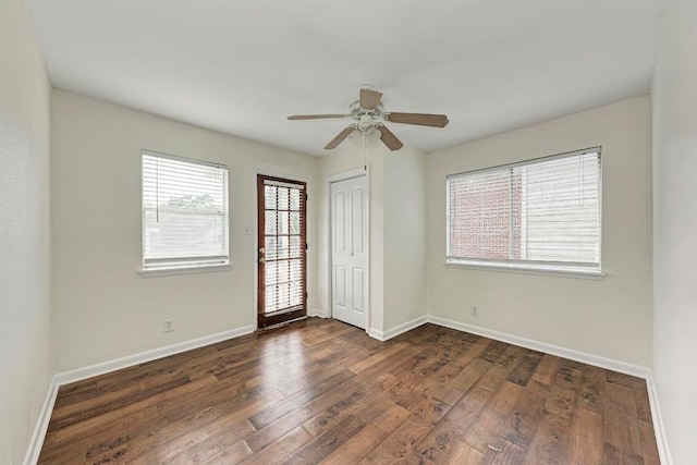 1010 W 23rd St Unit 2, Austin, TX 78705 - unfurnished room with dark wood-type flooring and a ceiling fan