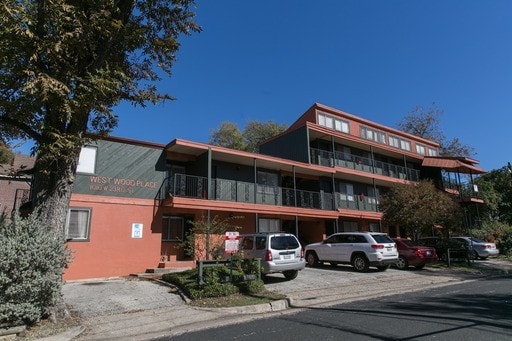 1010 W 23rd St Unit 2, Austin, TX 78705 - view of property featuring uncovered parking