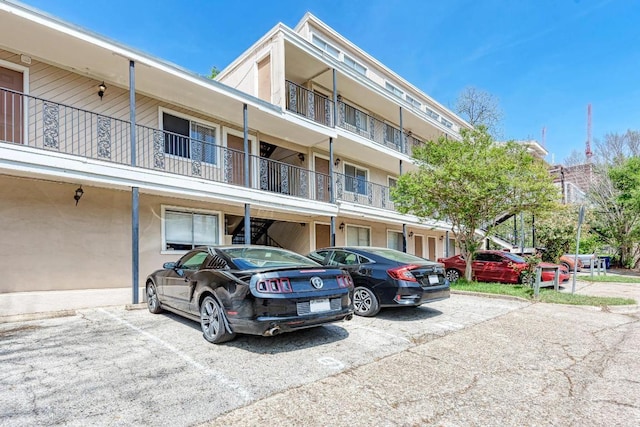1010 W 23rd St Unit 2, Austin, TX 78705 - view of building exterior with uncovered parking