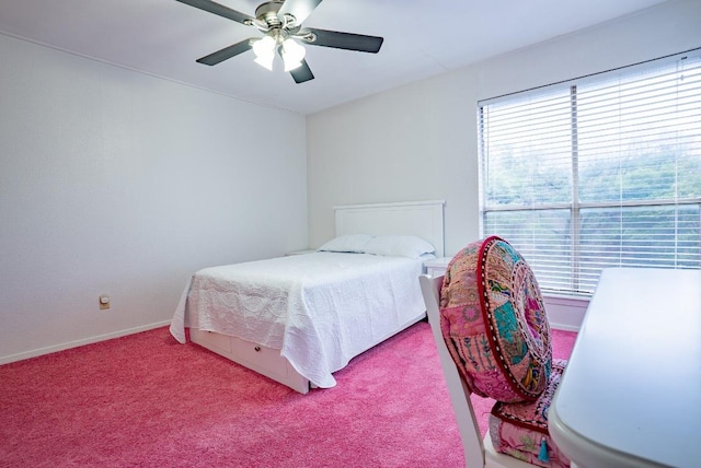 6903 Deatonhill Dr Unit 19, Austin, TX 78745 - carpeted bedroom with baseboards and ceiling fan