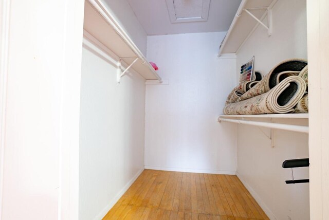 6903 Deatonhill Dr Unit 19, Austin, TX 78745 - walk in closet featuring light wood-style floors