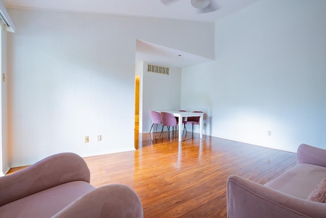 6903 Deatonhill Dr Unit 19, Austin, TX 78745 - living room with wood finished floors and ceiling fan