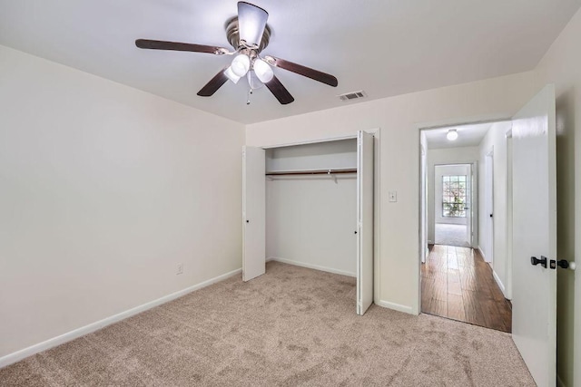 9504 Hansford Dr, Austin, TX 78753 - unfurnished bedroom featuring carpet flooring, a closet, and a ceiling fan