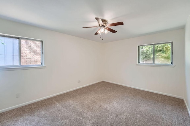 9504 Hansford Dr, Austin, TX 78753 - carpeted empty room featuring ceiling fan and baseboards