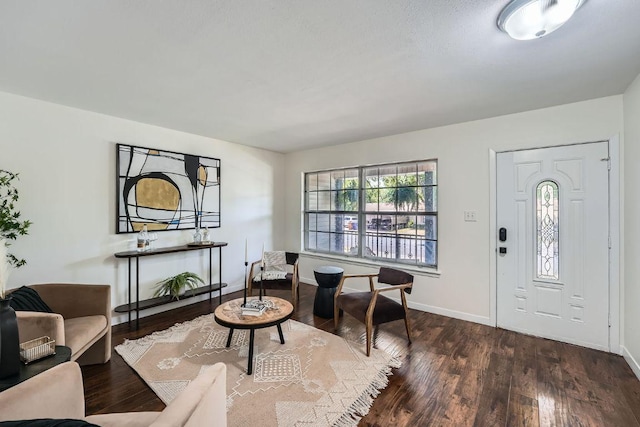 9504 Hansford Dr, Austin, TX 78753 - foyer entrance with dark wood-type flooring and baseboards