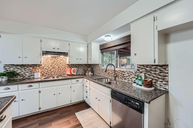 9504 Hansford Dr, Austin, TX 78753 - kitchen with appliances with stainless steel finishes, dark wood-style floors, backsplash, under cabinet range hood, and white cabinetry