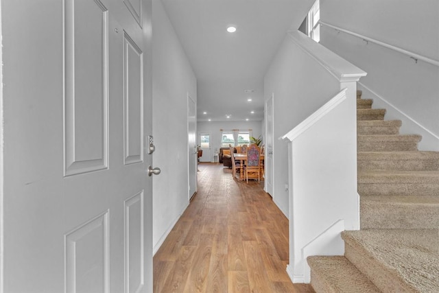 2961 Brogan Crk, New Braunfels, TX 78130 - foyer entrance with light wood-style floors, stairs, and recessed lighting