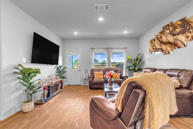 2961 Brogan Crk, New Braunfels, TX 78130 - living room with light wood finished floors and recessed lighting