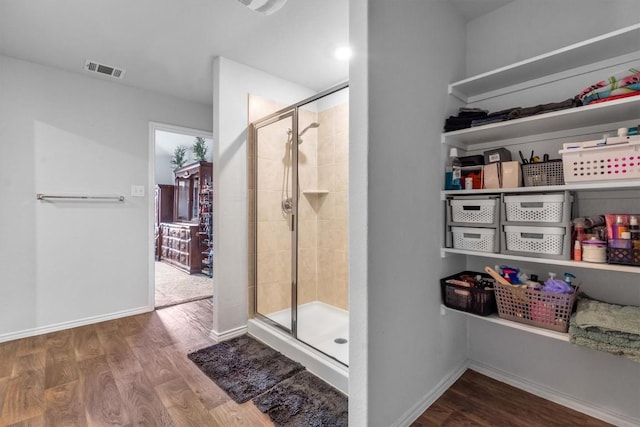 2961 Brogan Crk, New Braunfels, TX 78130 - full bathroom with a shower stall and wood finished floors