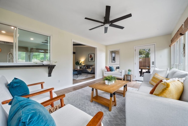 1406 Radam Cir, Austin, TX 78745 - living area with tile patterned floors, a ceiling fan, and recessed lighting