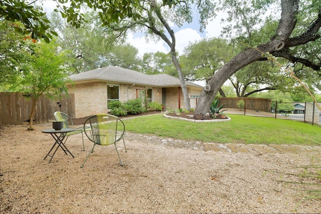 1406 Radam Cir, Austin, TX 78745 - rear view of property with brick siding