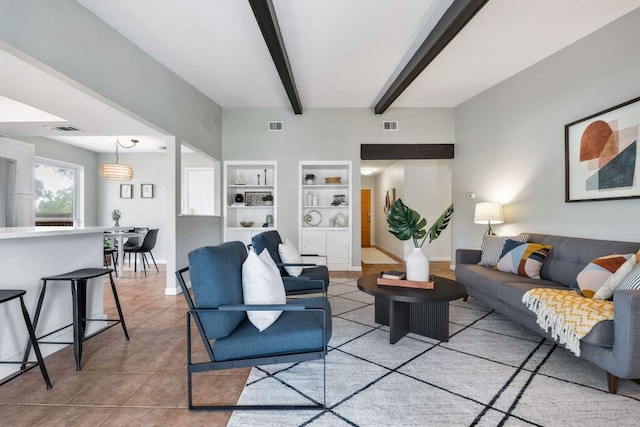 1406 Radam Cir, Austin, TX 78745 - living area with beamed ceiling, built in features, and light tile patterned flooring