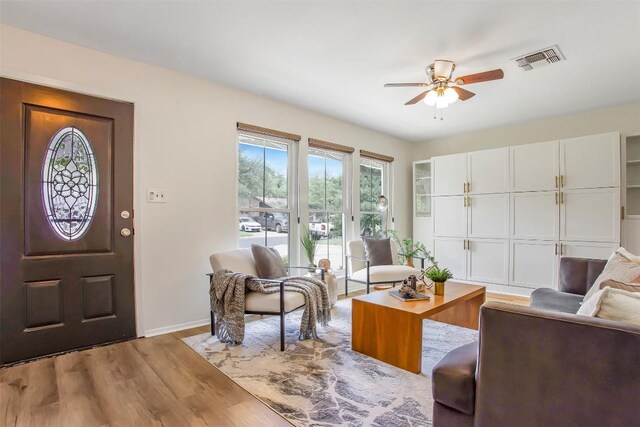 4504 Bilboa Dr, Austin, TX 78759 - living room featuring ceiling fan and wood finished floors