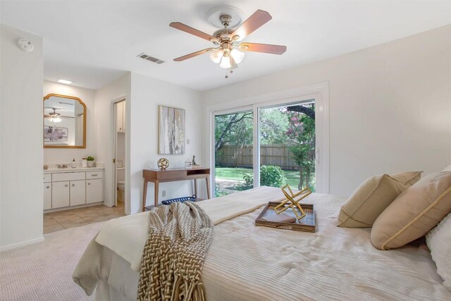 4504 Bilboa Dr, Austin, TX 78759 - bedroom with light colored carpet, ensuite bath, and ceiling fan