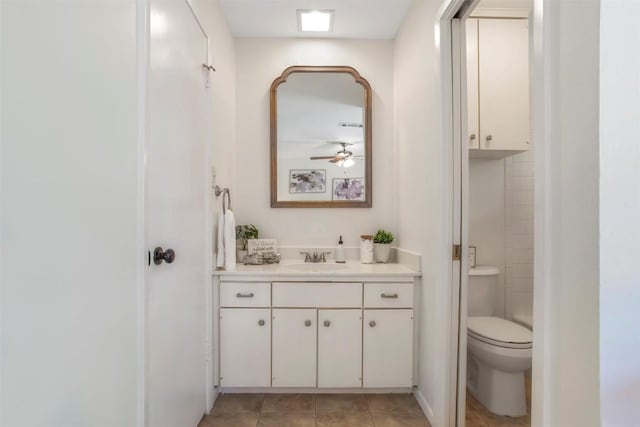 4504 Bilboa Dr, Austin, TX 78759 - bathroom with vanity, a ceiling fan, and tile patterned flooring