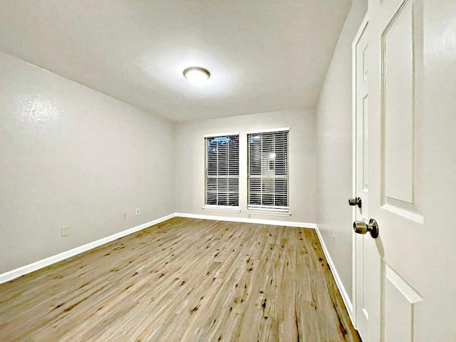 8501 Priest River Dr, Round Rock, TX 78681 - spare room with baseboards and wood finished floors