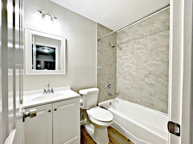 8501 Priest River Dr, Round Rock, TX 78681 - full bath featuring vanity, bathtub / shower combination, a textured wall, and wood finished floors