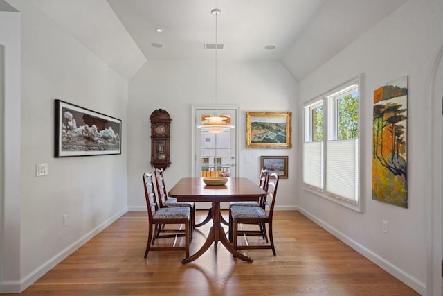 704 Texas Ave, Austin, TX 78705 - dining space featuring lofted ceiling and light wood-type flooring