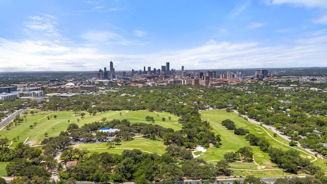 704 Texas Ave, Austin, TX 78705 - aerial view of property and surrounding area featuring skyline and a golf course