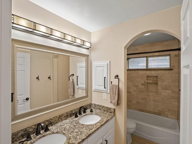 2520 Butler National Dr, Pflugerville, TX 78660 - bathroom with double vanity and  shower combination