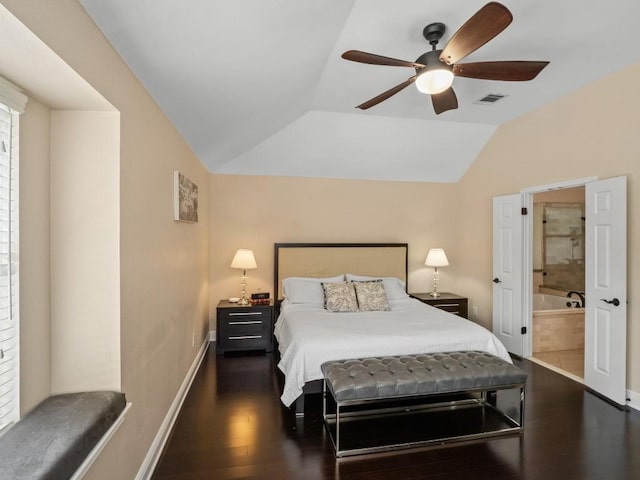 2520 Butler National Dr, Pflugerville, TX 78660 - bedroom featuring vaulted ceiling, dark wood-style flooring, ensuite bathroom, and a ceiling fan