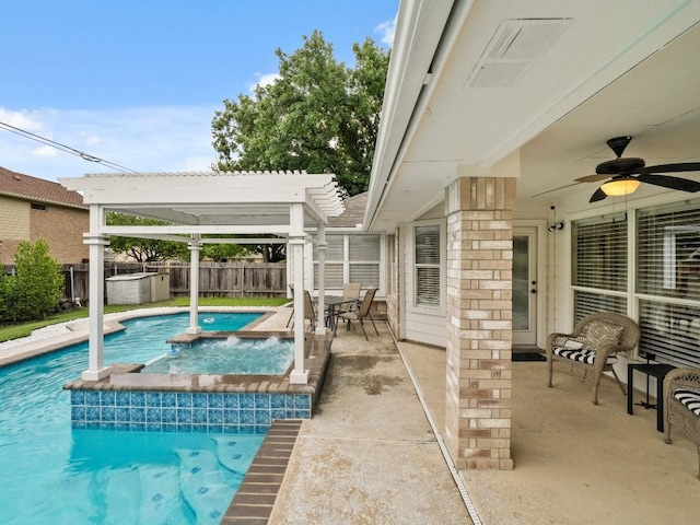 2520 Butler National Dr, Pflugerville, TX 78660 - view of swimming pool featuring an in-ground hot tub, ceiling fan, a fenced backyard, and a patio area