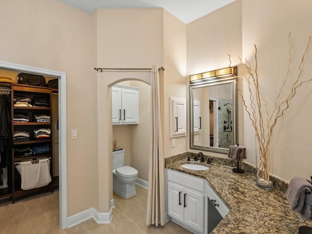 2520 Butler National Dr, Pflugerville, TX 78660 - full bath with vanity, tile patterned flooring, and a spacious closet