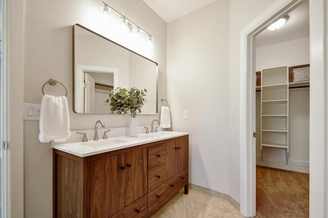 2109 Meadow View Dr, San Marcos, TX 78666 - full bathroom featuring double vanity and a spacious closet