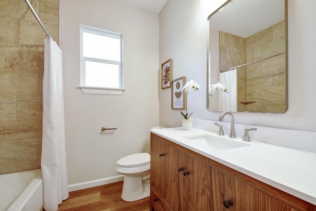 2109 Meadow View Dr, San Marcos, TX 78666 - bathroom with vanity, wood finished floors, and shower / bath combination with curtain