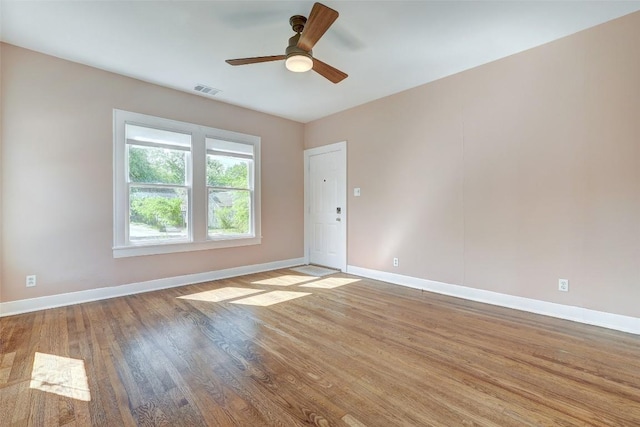 4412 Red River St, Austin, TX 78751 - unfurnished room with wood finished floors and ceiling fan