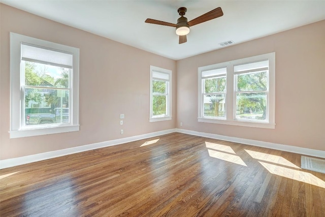 4412 Red River St, Austin, TX 78751 - empty room with wood finished floors and ceiling fan